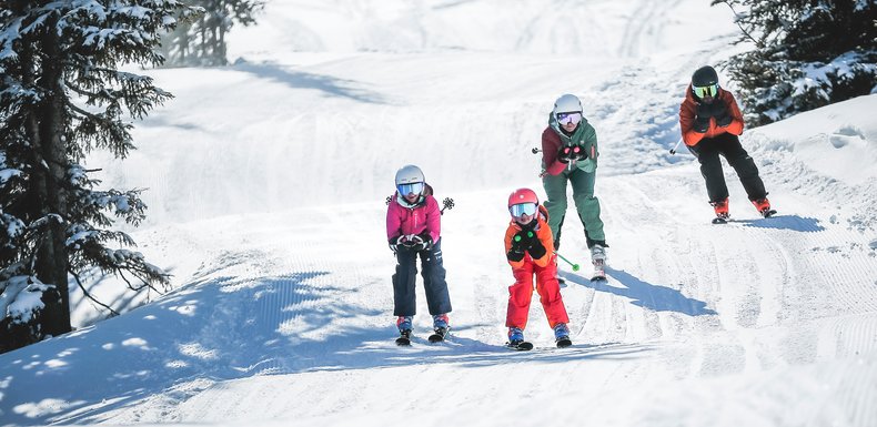 In der Hocke vollgas den Hügel runter | © Bergbahnen Fieberbrunn