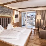 Photo of double room with 2 extra beds, shower, toilet