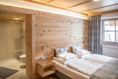 bedroom with double bed and bath en suite