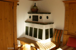 Wohnzimmer mit Kachelofen