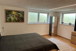 Schlafbereich im Souterrain-Apartment